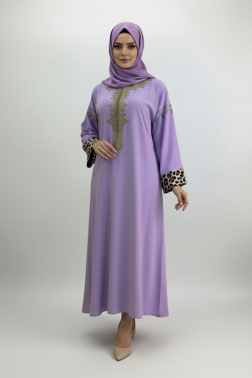 Gandoura violette et dorée manche léopard. ⚠ ça part vite !