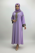Gandoura violette et dorée manche léopard. ⚠ ça part vite !